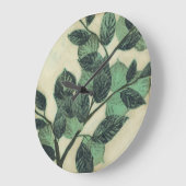 Blätter und Verzweigungen auf dem Hintergrund der Große Wanduhr (Winkel)