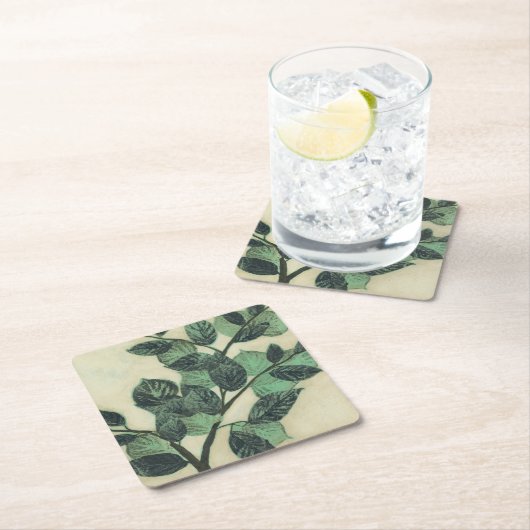 Blätter und Verzweigungen auf dem Hintergrund der Rechteckiger Pappuntersetzer (Vor Ort)