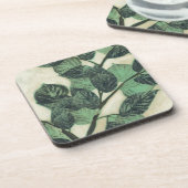 Blätter und Verzweigungen auf dem Hintergrund der Untersetzer (Linke Seite)