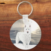 Blau mit Augen, weißer Husky im Schnee mit Artic S Schlüsselanhänger (Rückseite)