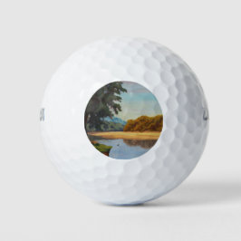 Blau und orange farbiger Strand Golfball