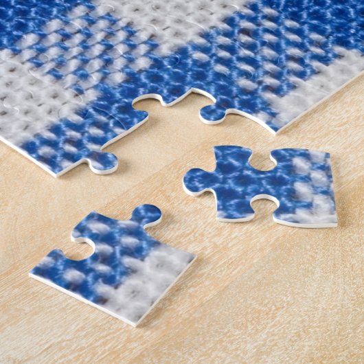 Blau-weiße ausgekleidete Esskleider. Puzzle (Seite)