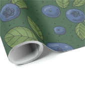Blaubeeren auf dunkelgrün geschenkpapier (Rolleneckpunkt)