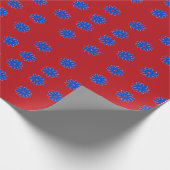 Blaue Blume in Rot Geschenkpapier (Ecke)
