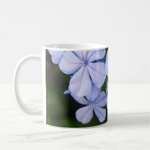 Blaue Blumen-Bokeh Kaffeetasse