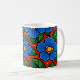 Blaue Blumen und grüne Blätter auf rotem Hintergru Kaffeetasse