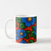 Blaue Blumen und grüne Blätter auf rotem Hintergru Kaffeetasse (Links)