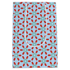 blaue Blumenmotive geometrisches Musterdesign Mittlere Geschenktüte