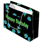 Blaue Blüte mit Schwarz Große Geschenktüte (Vorderseite Schrägansicht)