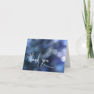 Blaue Bokeh-Licht/Typografie 32 Hochzeit Danke
