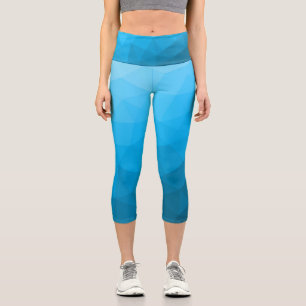 Blaue cyan türkisfarbene geometrische Netzstruktur Capri Leggings