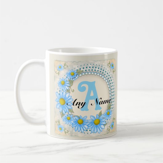 Blaue Daisy-Monogramm-Tasse Kaffeetasse (Links)