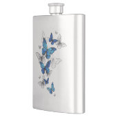 Blaue fliegende Schmetterlinge Morpho Flachmann (Links)