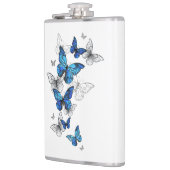 Blaue fliegende Schmetterlinge Morpho Flachmann (Links)