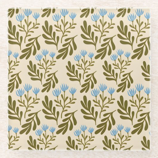 Blaue Glasflasche im Vintage-Stil mit botanischem  Glasuntersetzer (Vorderseite)