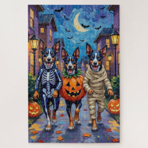 Blaue Heeler Hunde beim Trick-or-Treat an Hallowee Puzzle