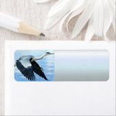 Blaue Herde im Flug über Wasser (Insitu)