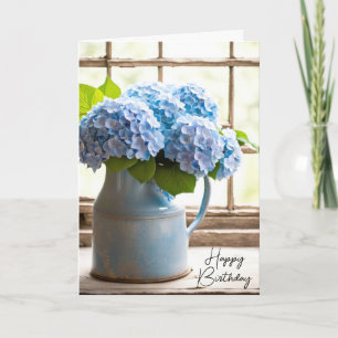 Blaue Hortensien-Geburtstagsbouquet im Fenster Karte