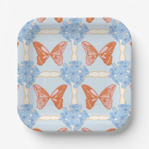 Blaue Hydrangeas und rosa und orangefarbene Schmet Pappteller