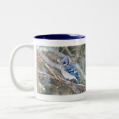 Blaue Jay im Schneesturm Zweifarbige Tasse (Links)