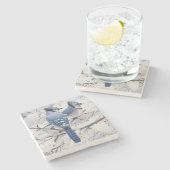 Blaue Jay in einem schneebewachsenen Baum Steinuntersetzer (Seitenansicht)