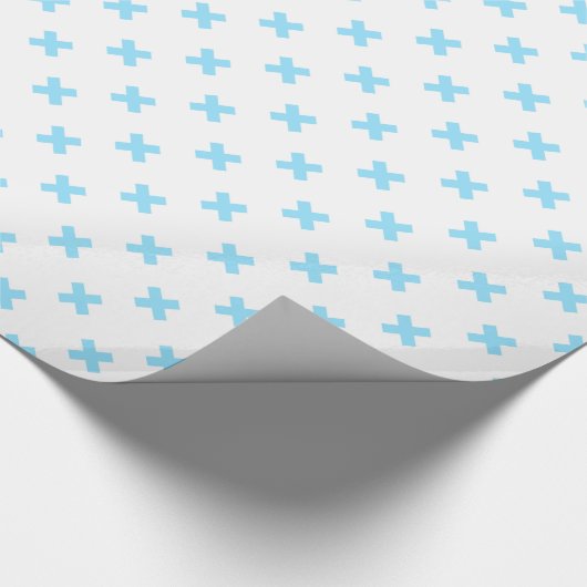 Blaue Kreuzstiche auf weiß Geschenkpapier (Ecke)