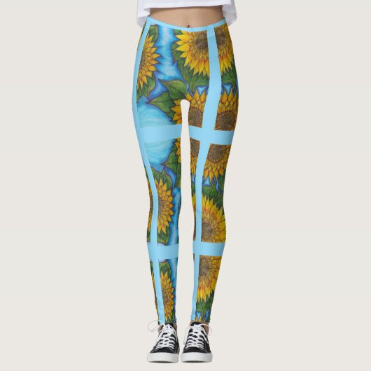 Blaue Leggings mit gelben Sonnenblumen und Streife (Vorderseite)