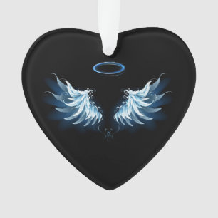 Blaue leuchtende Engelsflügel auf schwarzem Hinter Ornament