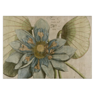 Blaue Lotusblume auf braunem Hintergrund mit Schri Schneidebrett