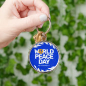 Blaue Orange Weltfriedenstag Schlüsselanhänger (Hand)