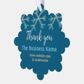 Blaue Orangenschneeflocken geben den Namen Weihnac Ornament Karte (Linke Ecke)