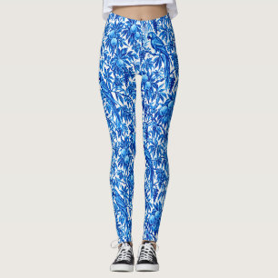 Blaue Papageien in einem tropischen Garten Leggings