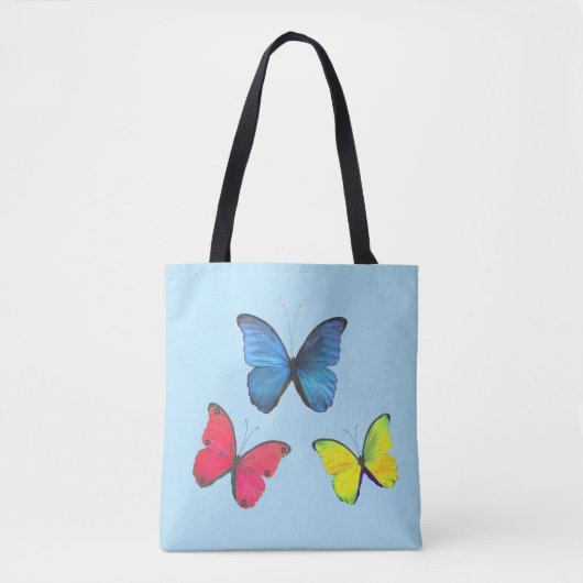 Blaue rote und gelbe Schmetterlinge auf hellblauen Tasche (Vorderseite)