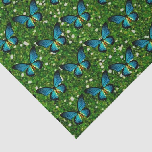 Blaue Schmetterlinge auf grünem Glitzer Seidenpapier (Ausschnitt)
