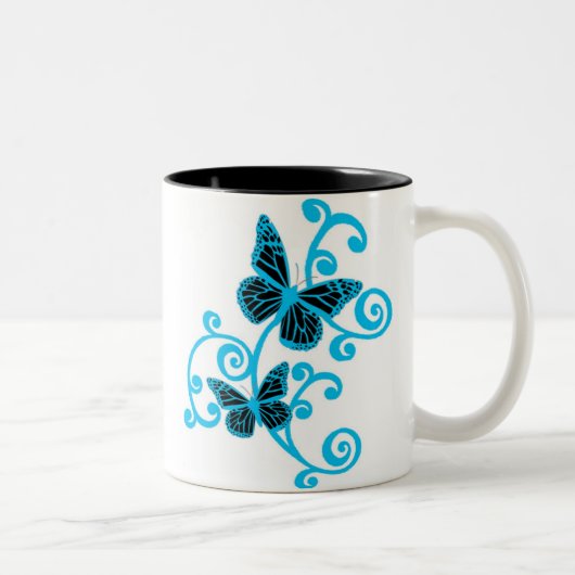 blaue Schmetterlinge Zweifarbige Tasse (Rechts)