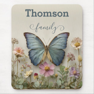 Blaue Schmetterlings-Blumengarten-Familie im Vinta Mousepad