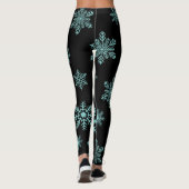 Blaue Schneeflocken auf schwarzen Leggings (Rückseite)