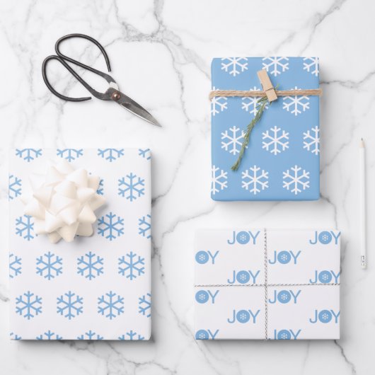 Blaue Schneeflocken und fröhliches Weihnachtsmuste Geschenkpapier Set (Vorderseite)
