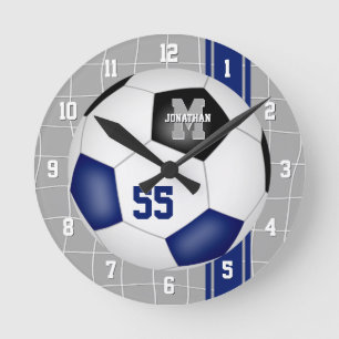Blaue schwarze Mannschaftsfarben Farbenfrohe Strei Runde Wanduhr