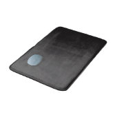 Blaue Seife auf schwarzem Tile Badematte (Schrägansicht)