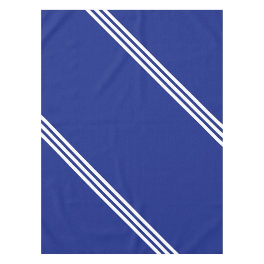 Blaue Tablette mit weißem Streifen oder Farben aus Tischdecke (Vorderseite)