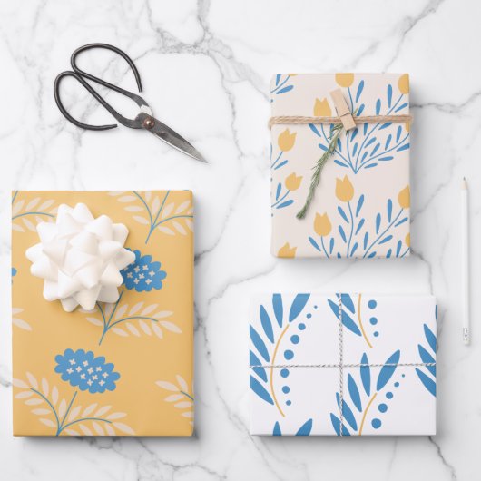 Blaue und orangefarbene Blumenumhüllungsblätter Geschenkpapier Set (Vorderseite)