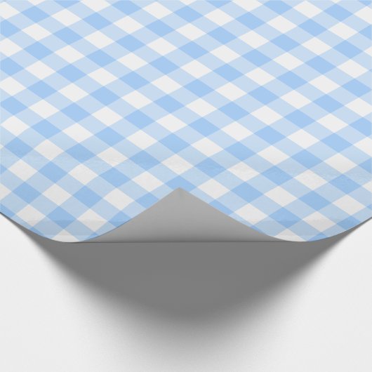 Blaue und weiße gemusterte Verpackung des Ginghams Geschenkpapier (Ecke)