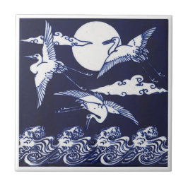 Blaue und weiße Kraniche mit Wellen und Mond im Vi Fliese