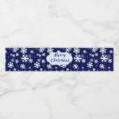 Blaue und weiße Schneeflocken auf dunkelblauem Bod Wasserflaschenetikett (Einzelnes Label)