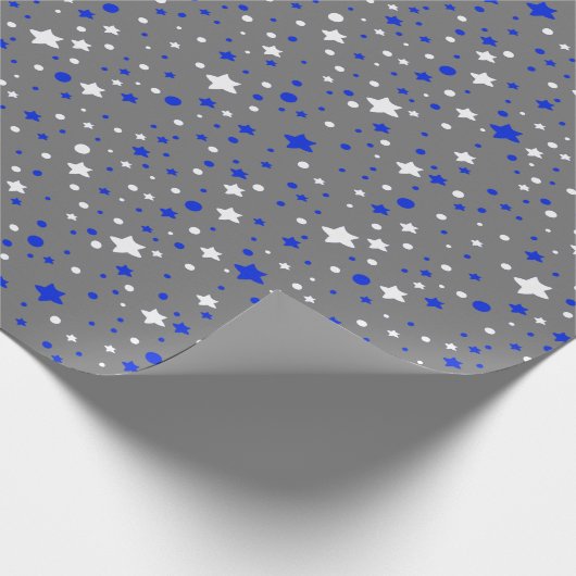 Blaue und weiße Sterne auf Grau Geschenkpapier (Ecke)