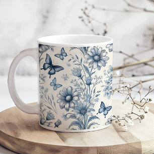 Blaue und weiße Vintage-Blumen- und Schmetterlings Kaffeetasse
