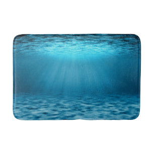 Blaue Unterwasser-Ozean-Lichtstrahlen Badematte