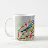 Blaue Vogelbrille auf Kirschblossom Wasserfarbe Kaffeetasse (Links)
