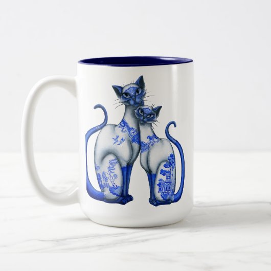 Blaue Weide-siamesische Katzen Zweifarbige Tasse (Links)